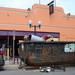 A contractor digs through a trash container as he looks to salvage some of the contents from inside of the former Dream Nite Club on Monday morning.  Melanie Maxwell I AnnArbor.com